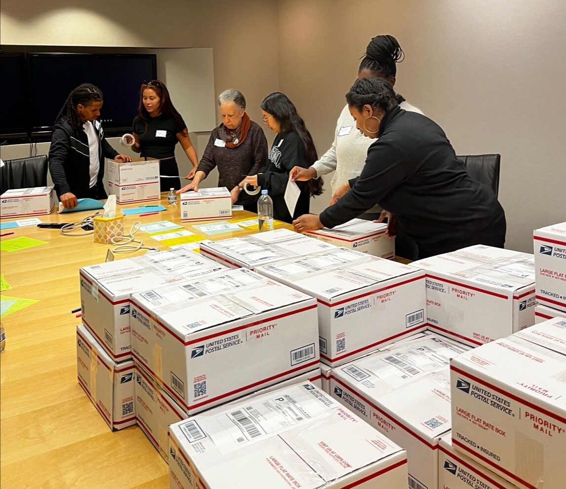 ASF community members assemble care packages.